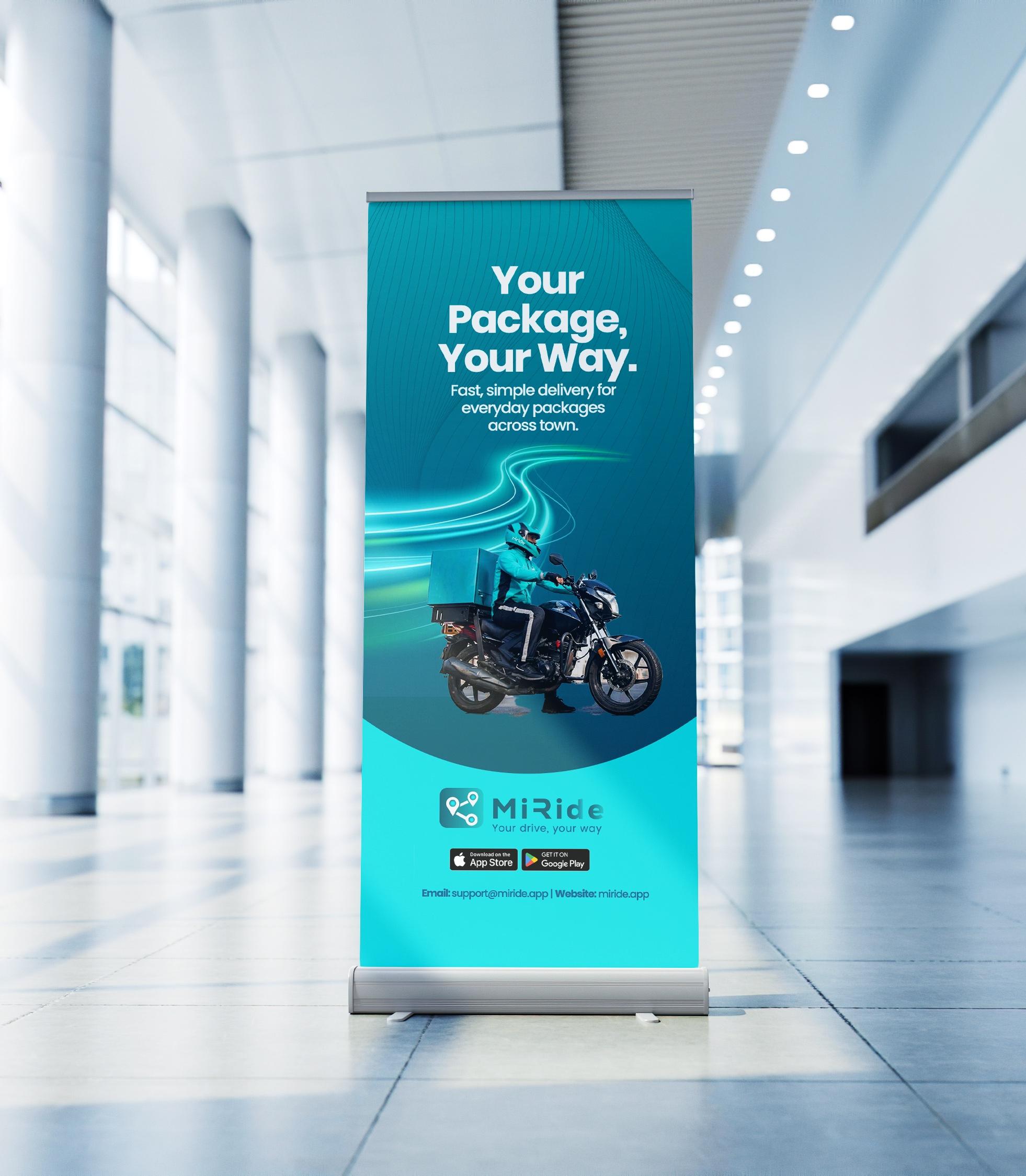 MiRide pull-up banner at our office showing Your Package, Your Way
